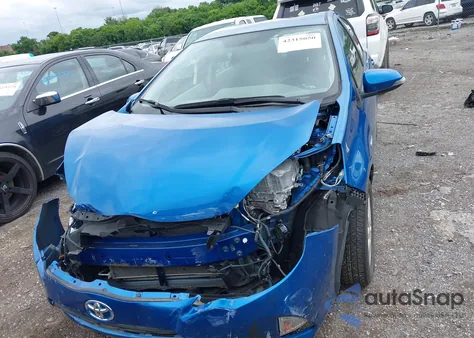 2014 Toyota Prius C Three z USA, uszkodzony, nr VIN JTDKDTB35E1560619